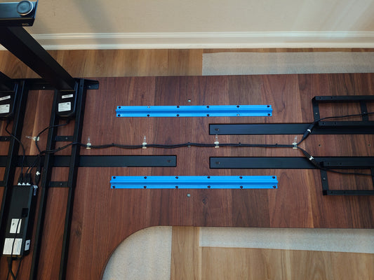 Anti-Sag Bar joining two desktops