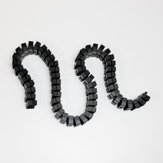 Wire Snake cable spine running from floor to desktop