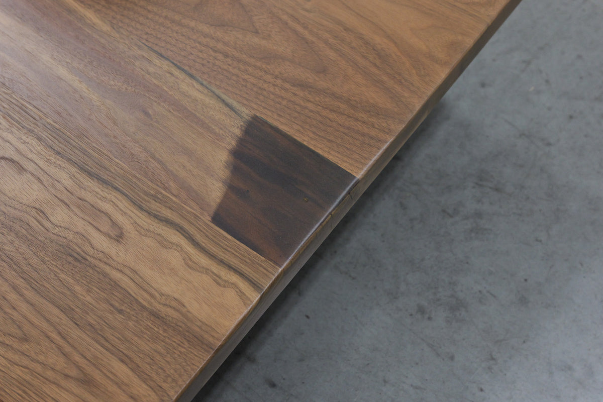 Large epoxy patch and small crack at the edge