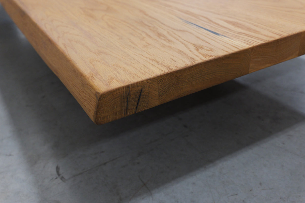 Filled cracks in the end grain at the corner